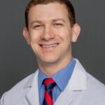 John E. Nawn, MD